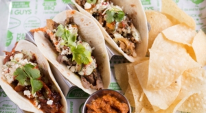 kimchi guys tacos with chips and salsa